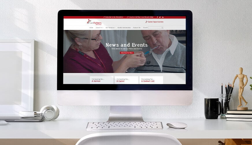 CarePartner's website in a computer monitor